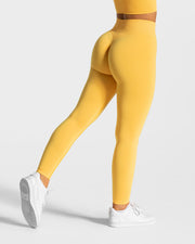 طقم رياضي نسائي بظهر شبك - أصفر - Miss Fashion X